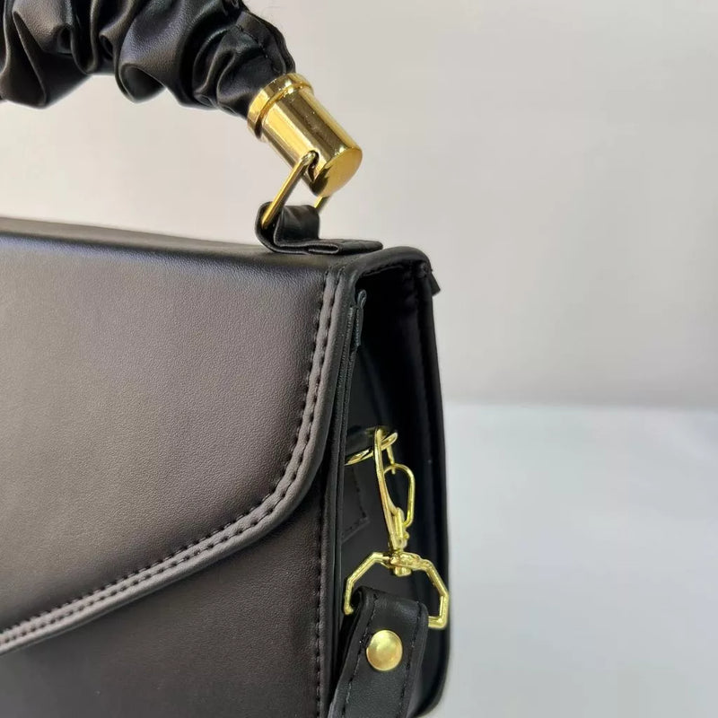 Bolsa transversal de mão feminina