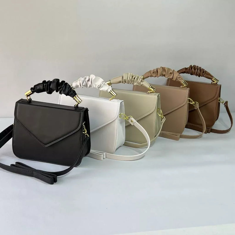 Bolsa transversal de mão feminina